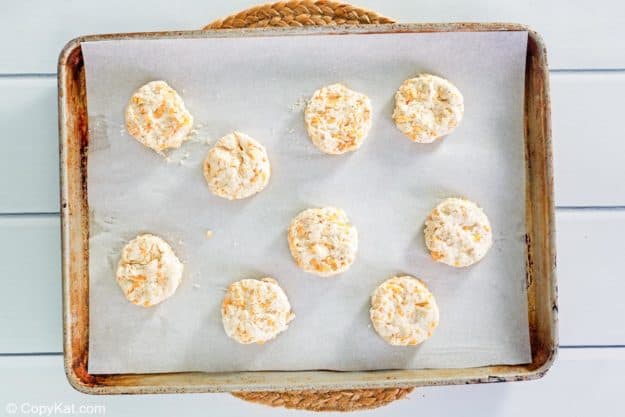 Red Lobster Cheddar Bay Biscuits dough cutouts on a baking sheet