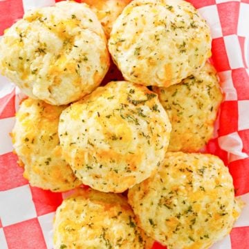 Copycat homemade Red Lobster Cheddar Bay Biscuits in a basket.