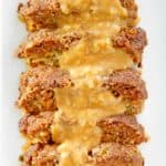 overhead view of stuffed meatloaf with gravy on a platter