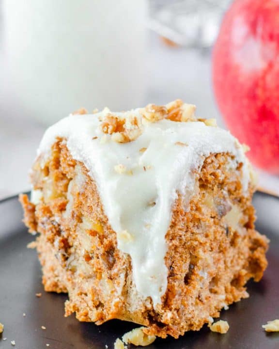 a slice of apple spice bundt cake on a plate.