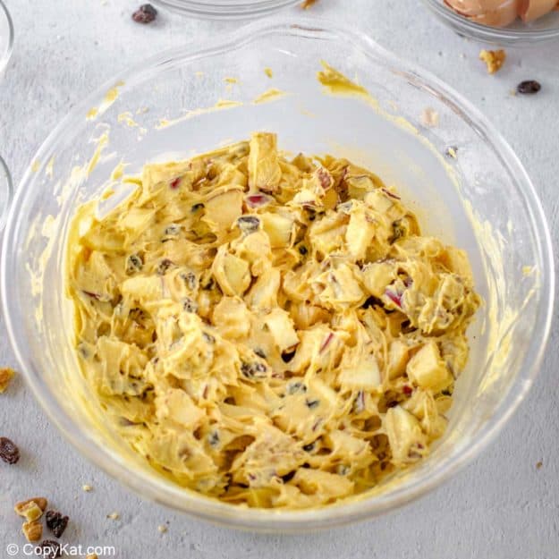 apple spice cake batter in a mixing bowl.