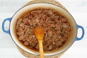 browned stew meat and onions in a Dutch oven.