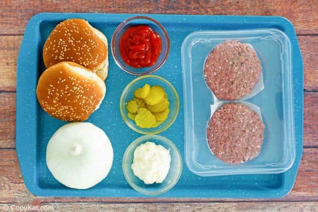 Burger King Impossible Whopper ingredients on a tray.