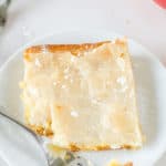 a slice of gooey butter cake on a plate.