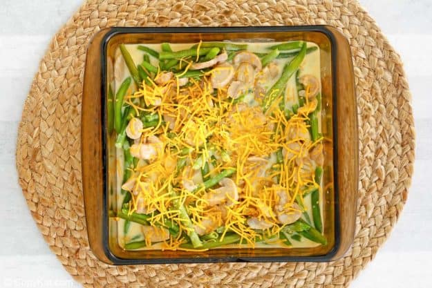 green bean casserole with cheese before baking.