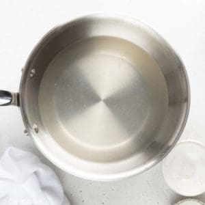 simple syrup and lemon juice in a pan.