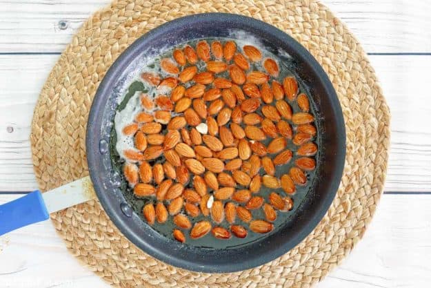 cooking almond brittle in a pan.