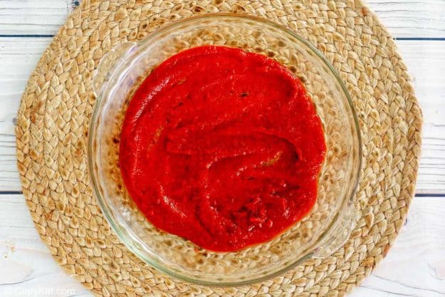 marinara sauce in a pie plate.