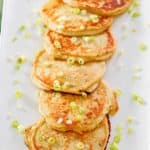 fried mashed potato pancakes on a platter.