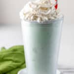 homemade McDonald's Shamrock Shake and a green kitchen towel.