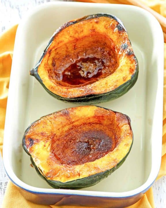microwave acorn squash in a serving dish.