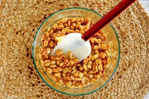 microwave peanut brittle mixture in a bowl.