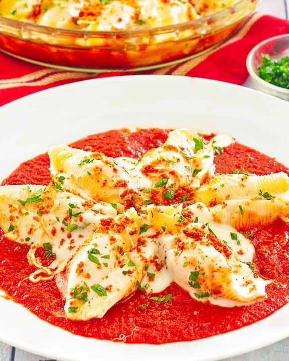 homemade Olive Garden giant cheese stuffed shells in a pasta bowl.