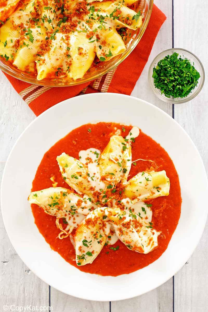 overhead view of homemade Olive Garden giant cheese stuffed shells.