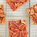 overhead view of pecan pie brownies on a wire rack.