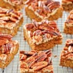 pecan pie brownies on a wire rack.