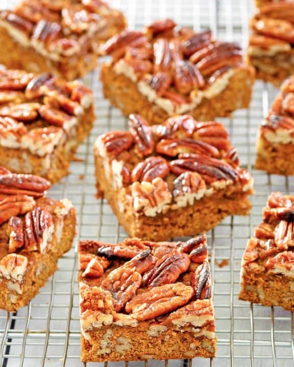 pecan pie brownies on a wire rack.