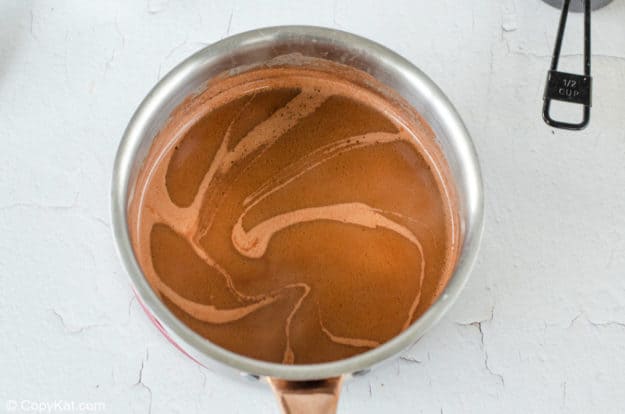 melted butter, cocoa, and water mixture in a saucepan.