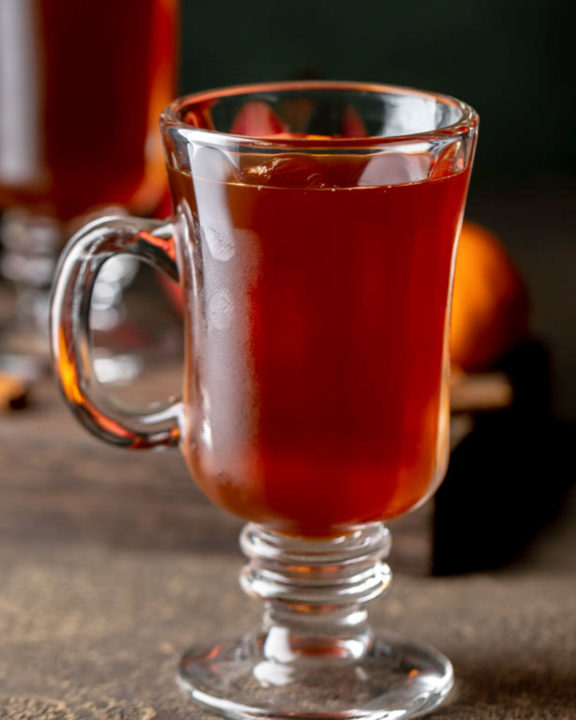 wassail in a glass mug.