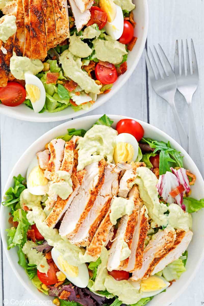 overhead view of homemade Chick Fil A cobb salad in two bowls.