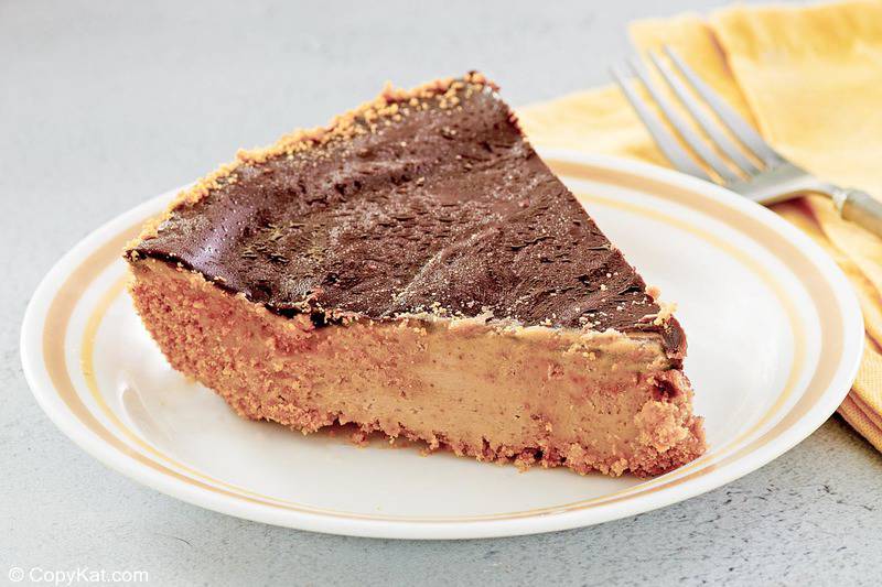 chocolate peanut butter pie slice on a plate.