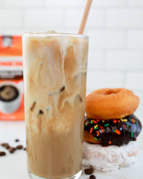 homemade Dunkin Donuts iced coffee with milk and donuts.
