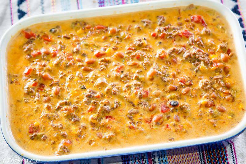 hamburger dip in a rectangular serving dish.