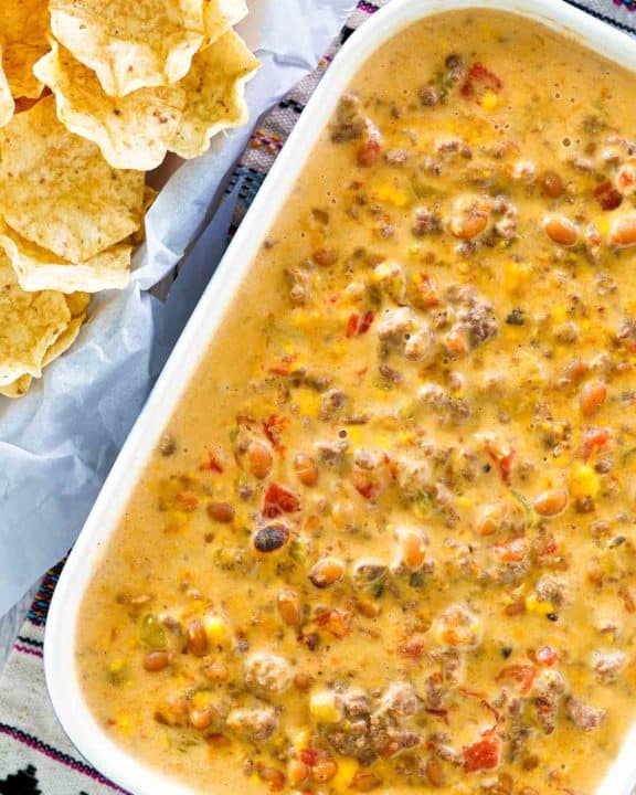 overhead view of hamburger dip and tortilla chips.