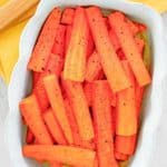 overhead view of honey roasted carrots in a serving dish.
