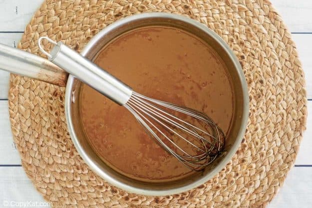 oatmeal cake frosting caramel base in a pan.
