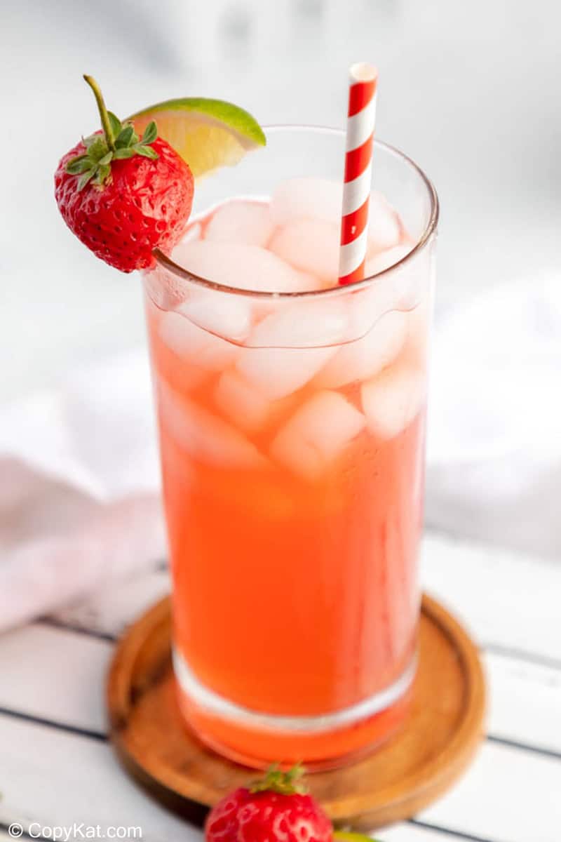 Homemade Olive Garden Italian Rum Punch cocktail on a coaster.