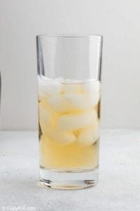 Asti and ice in a tall glass.