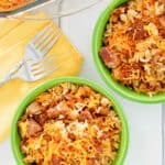 overhead view of sausage and rice casserole in bowls and baking dish.