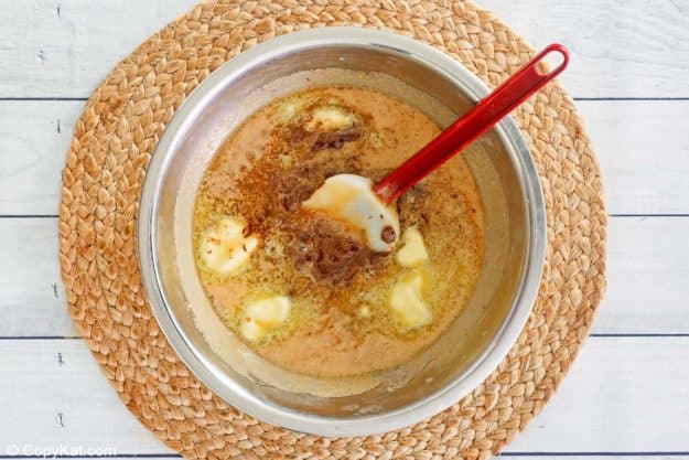 chocolate, butter, and milk mixture in a bowl.