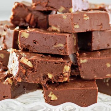 homemade See's fudge on a cake stand.
