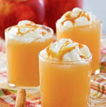 homemade Starbucks caramel apple spice drink in three mugs.