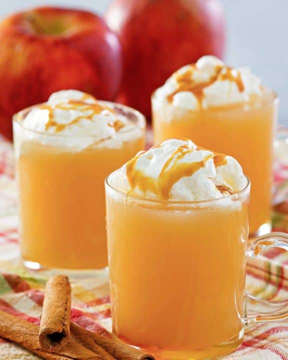 homemade Starbucks caramel apple spice drink in three mugs.