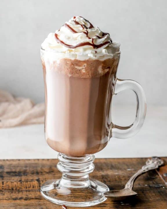 homemade Starbucks hot chocolate topped with whipped cream and chocolate syrup.