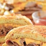 homemade Arby's beef and cheddar cut in half.