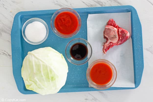 cabbage soup ingredients on a tray.