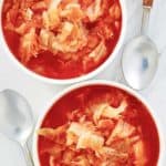 overhead view of cabbage soup in two bowls.