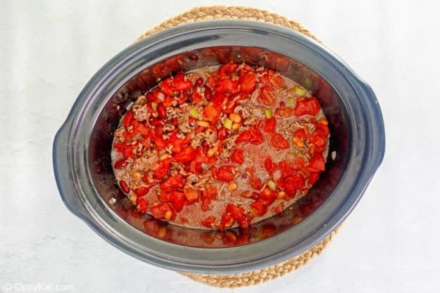 chili ingredients in a crockpot before cooking.