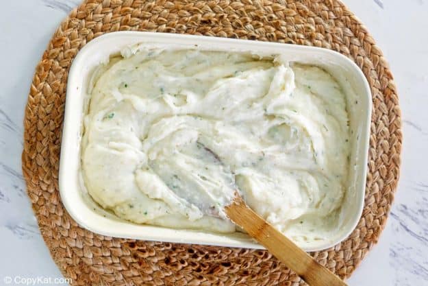 mashed potato casserole mixture in a baking dish.