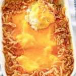 mashed potato casserole with cheese and crispy fried onions on top.