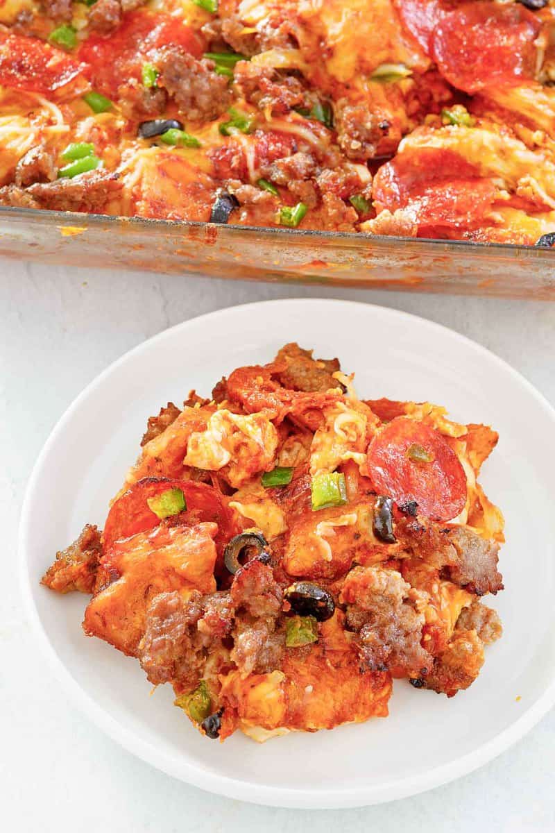 overhead view of pizza monkey bread on a plate and in a baking dish.
