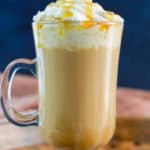homemade Starbucks caramel macchiato topped with whipped cream.