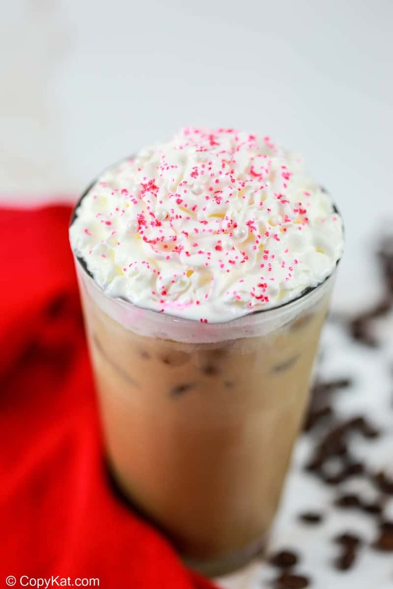 homemade Starbucks iced toasted white chocolate mocha topped with whipped cream.