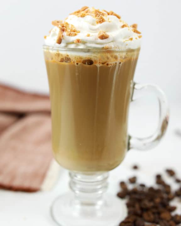 homemade Starbucks smoked butterscotch latte in a glass coffee mug.