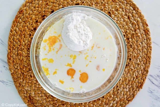 Yorkshire pudding batter ingredients in a mixing bowl.