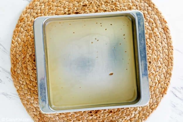 roast beef drippings in a baking dish.